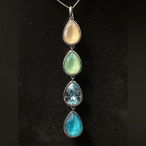 Touchstone Crystal multicolored crystal pendant.